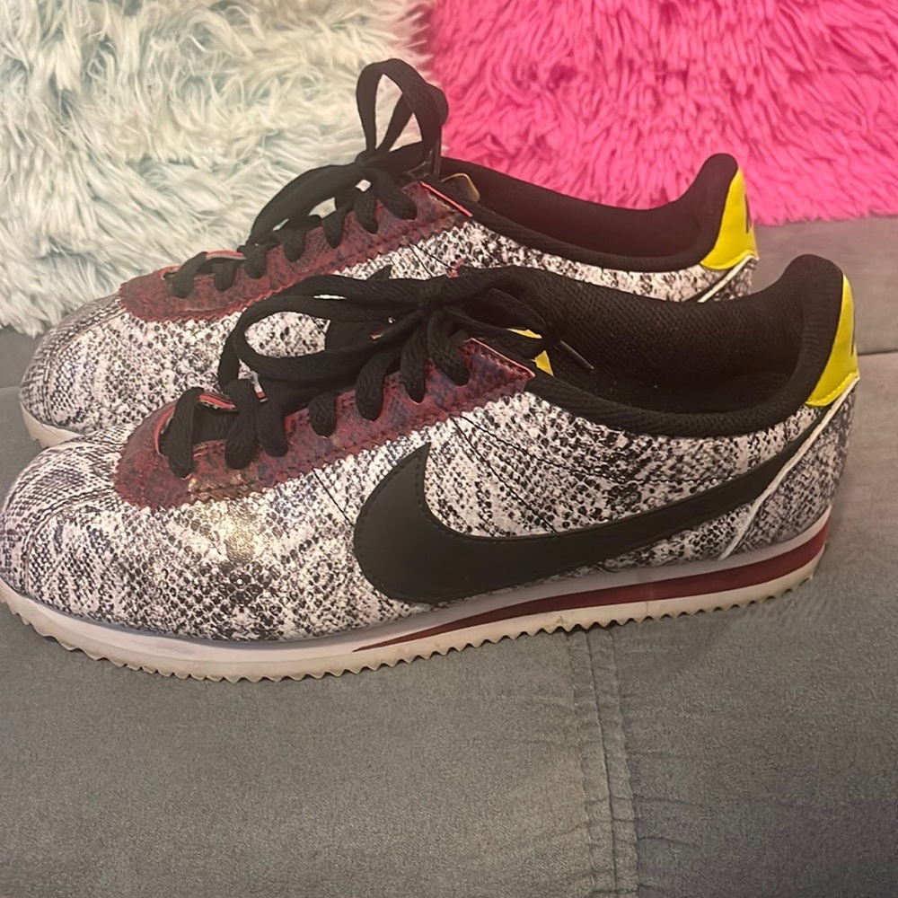 Women’s snake print sneakers